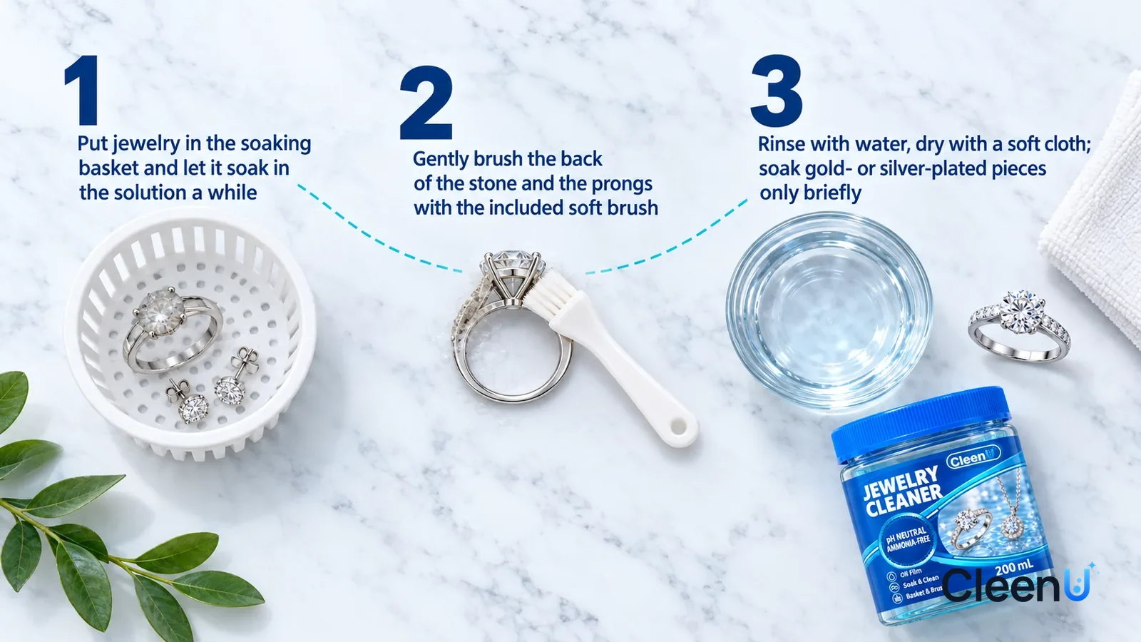 Illustration: CleenU Jewelry Cleaner — an overhead shot straight down onto a light marble tabletop, no bottle and no hands: (1) a small white slotted soaking basket holding a diam