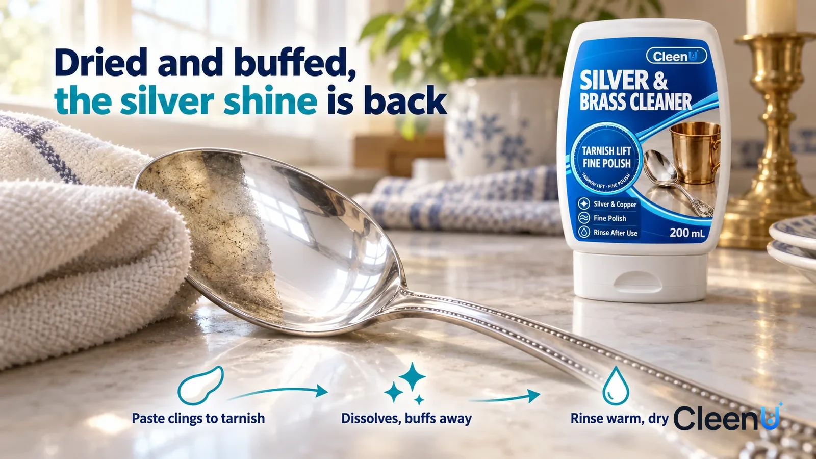 Illustration: CleenU Silver & Brass Cleaner — a soft cloth has just made one pass, the wiped strip bright silver and reflecting the window light, a little yellow tarnish still beside it